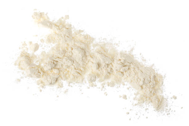 istock Pile of flour isolated on white background. Top view. Flat lay 1288407136