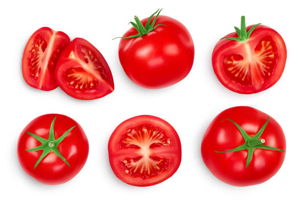 istock Tomato with half and slices isolated on white background. Clipping path and full depth of field. Top view. Flat lay 1288411108