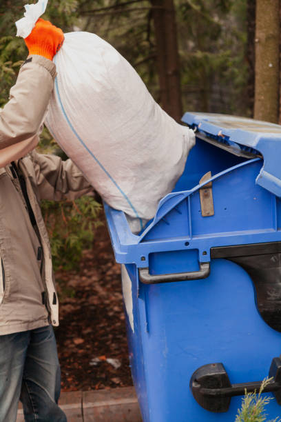 istock White bag is placed in trash can 1288411590