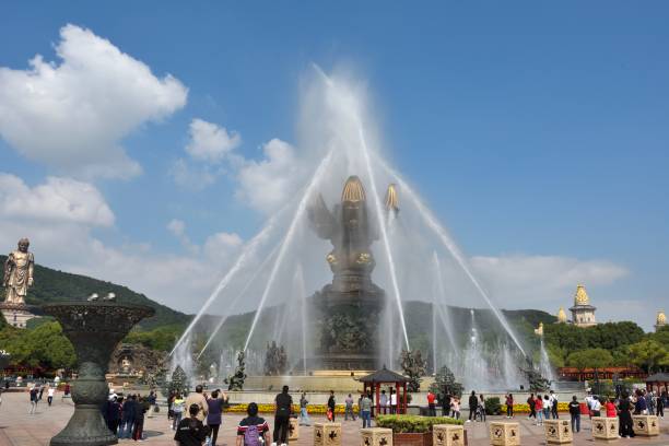 Wuxi, Jiangsu Province,China.Grand Buddha at Ling shan is a world famous scenic spot and a national AAAAA tourist attraction.It is 88 meters high and made of 725 tons of copper.Lingshan Giant Buddha is one of the city symbols of Wuxi, which is of great significance to social culture and economic development.This is the scenic spot, where there are lotus and music fountain, lotus and fountain will automatically open and close with the music.Many tourists come here every day of the year.