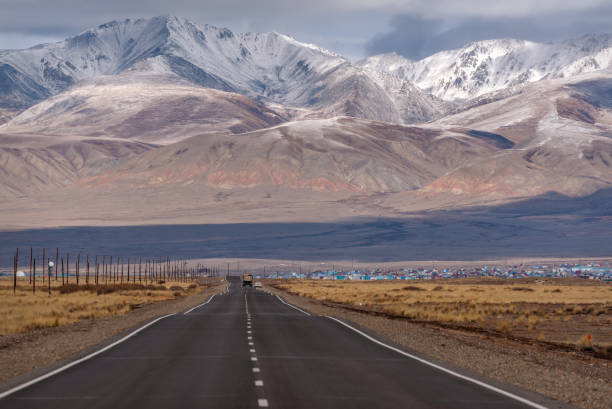 istock road asphalt mountains snow autumn 1288418645