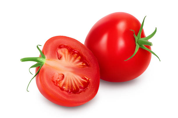 istock Tomato with half isolated on white background with clipping path and full depth of field. 1288418959