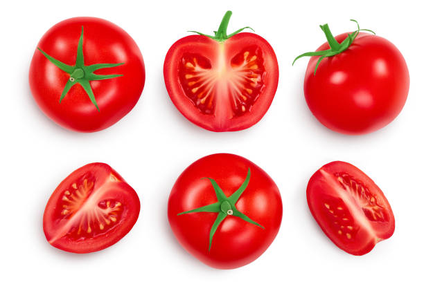 istock Tomato with half and slices isolated on white background. Clipping path and full depth of field. Top view. Flat lay 1288418965