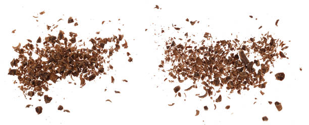 istock grated chocolate isolated on white background. Top view 1288420207