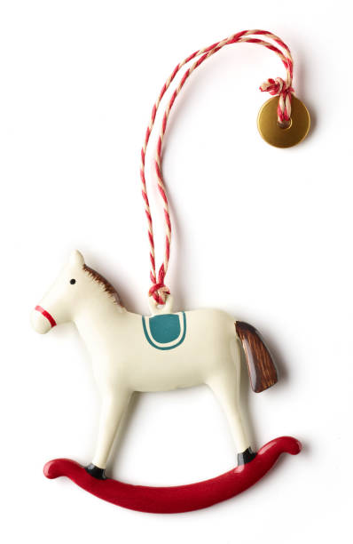 istock Christmas rocking horse decoration isolated on white 1288424667