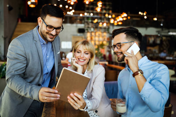istock Business colleagues having conversation during coffee break 1288428951