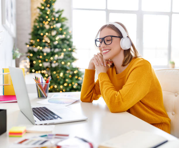 istock Cheerful freelancer making video call on Christmas day 1288430094