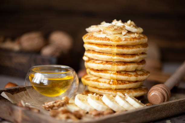istock small pancakes with banana, walnuts and honey 1288431618