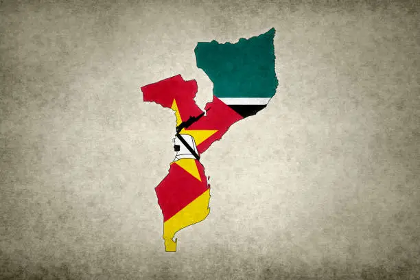 Photo of Grunge map of Mozambique with its flag printed within