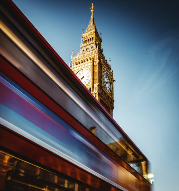 London, England, United Kingdom (UK), Britain, Europe – On July 12, 2024: London's iconic red bus, Big Ben is seen near Trafalgar Square. Whitehall, London SW1.