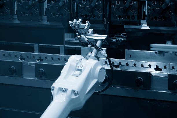 istock The robotic arm operation at hydraulic bending machine. 1288432878