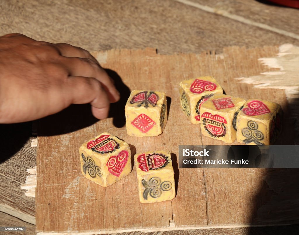 Nepales game children playing a Nepalese game with dice in Kathmandu Valley Close-up Stock Photo