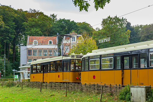 Arnhem, The Netherlands - October 10, 2020: Train station with yellow historic train in Open air museum in Arnhem, Gelderland, Netherlands