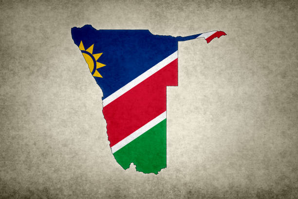 Grunge map of Namibia with its flag printed within its border on an old paper.