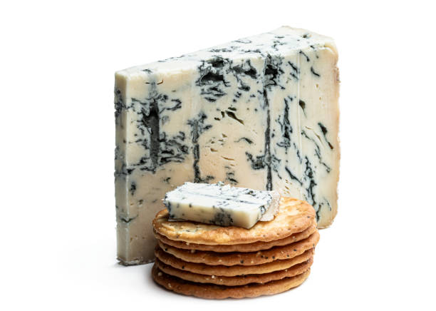istock Gorgonzola cheese with grape and crackers isolated on white 1288439873