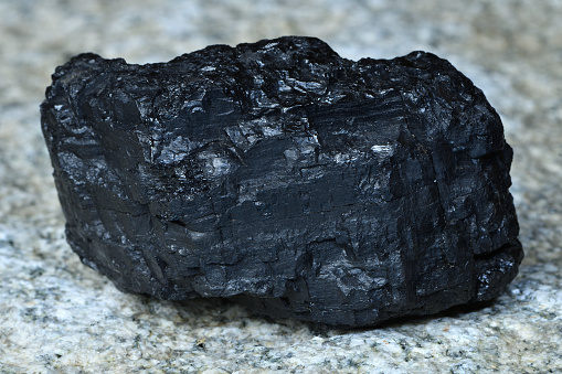 Fuel for furnace heating - hard coal. Pile of natural black hard coal for texture background. Best grade of metallurgical anthracite coals often referred to as stone coal and black diamond coal.