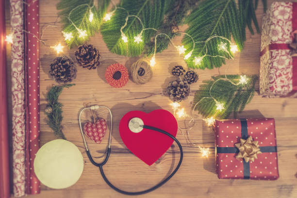 istock Christmas flat lay with Christmas light and gift box on a medical theme. 1288444945