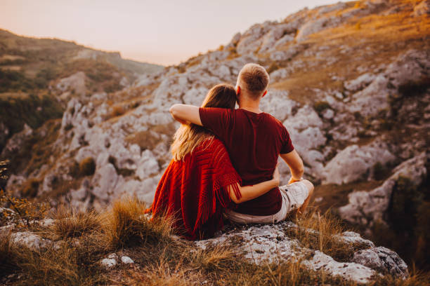 istock Happy Man and woman on a romantic camping vacation 1288445074
