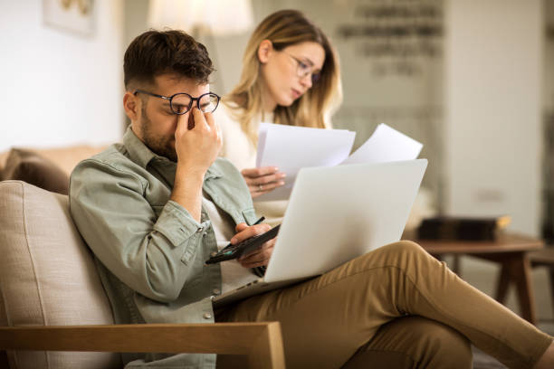 istock Young couple having some financial difficulties 1288445603
