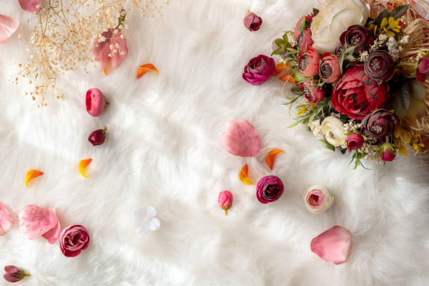 istock Floral romantic background with bridal bouquet on fur 1288447436
