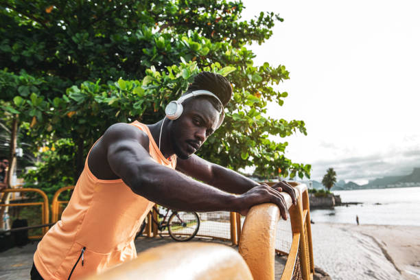 istock Sportsman exercise on the beach 1288447689