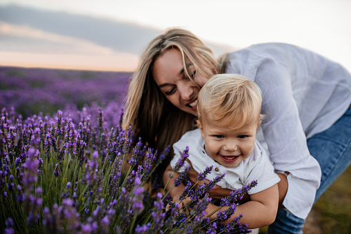 Mother and her little son enjoying some quality time together at the lavender field