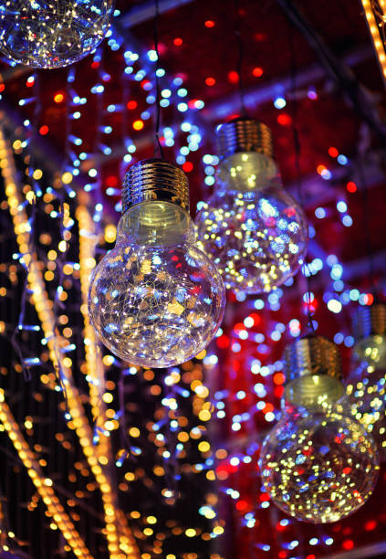 istock HOLIDAY CHRISTMAS LIGHTS IN BULBS ON A DARK BACKGROUND 1288454823