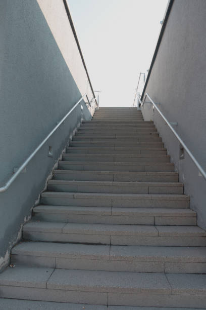 istock red granite staircase outdoors with metal railing 1288455714