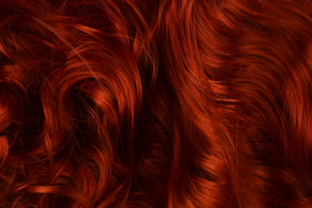 istock Red hair background. Curly red hair. 1288457567