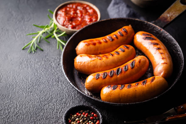 istock Fried delicious sausages 1288460878