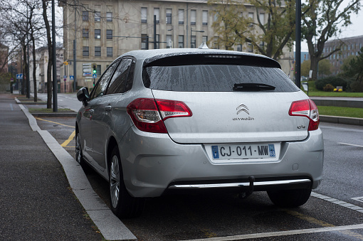 Mulhouse - France - 29 November 2020 - Rear view of grey Citroen C4 parked in the street