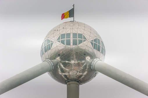 The Atomium is a building in Brussels originally constructed for Expo 58, the 1958 Brussels World's Fair. Designed by the engineer André Waterkeyn and architects André and Jean Polak, it stands 102 m tall