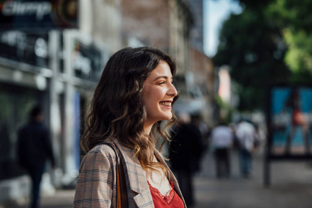 istock A Good-looking Young Woman Smiling on a Sunny Day 1288466289