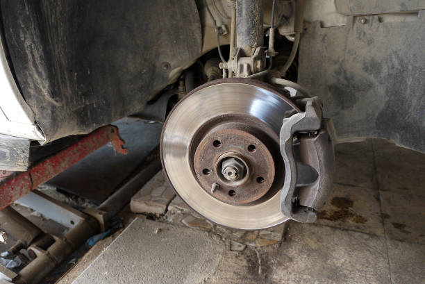 istock front-wheel disk brakes in an automobile mechanic, automobile brake discs, 1288469358