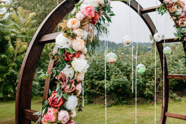 istock Floral decor wedding arch with roses 1288470362