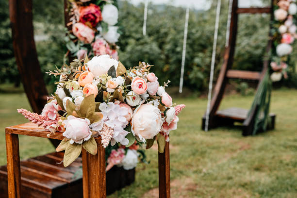 istock Floral decor wedding arch with roses 1288470453