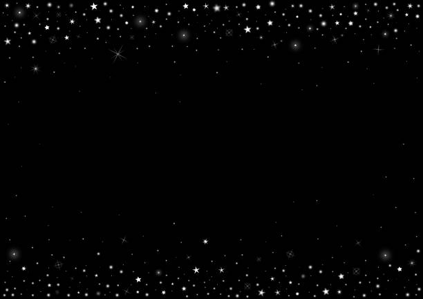 istock White stars and sparkles on a black background 1288472574