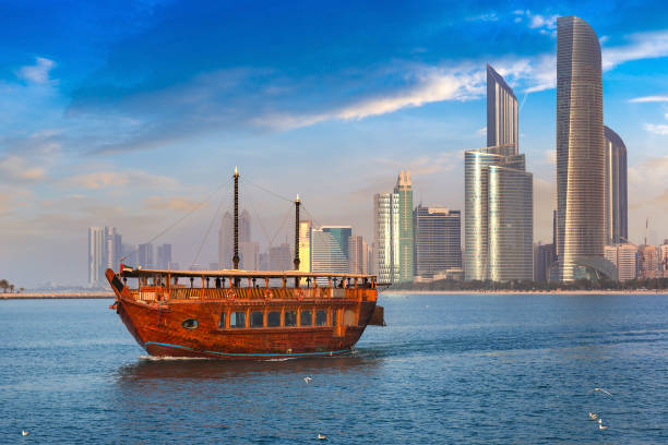 Traditional Dhow boat in Abu Dhabi Cruise on traditional Dhow boat in Abu Dhabi in a summer day, United Arab Emirates dhow photos stock pictures, royalty-free photos & images