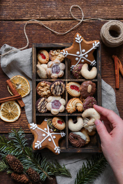 istock christmas cookie box with gingerbread in rustic wood kitchen 1288476746