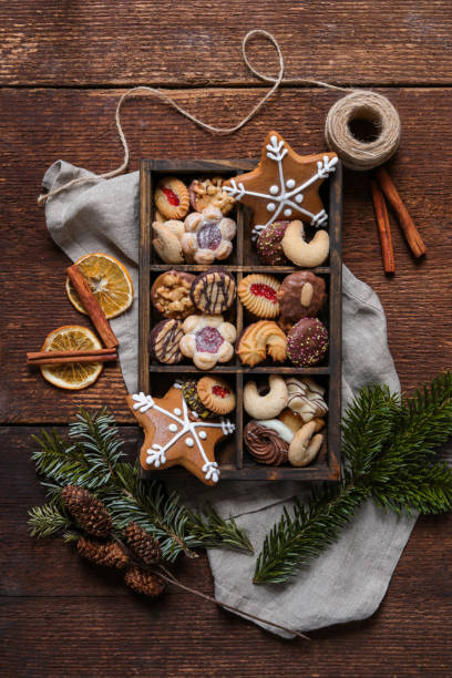 istock christmas cookie box with gingerbread in rustic wood kitchen 1288476831