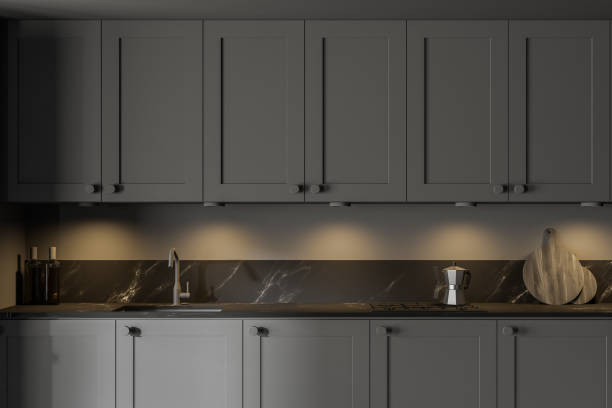 istock Modern gray kitchen interior with cabinets, close up 1288476832