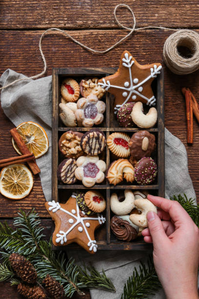 istock christmas cookie box with gingerbread in rustic wood kitchen 1288476896
