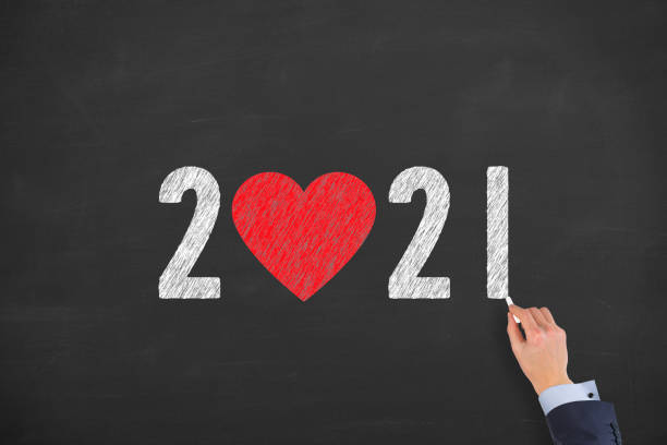 istock New Year 2021 with Heart Shape on Chalkboard Background 1288479430