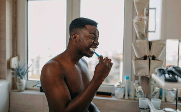 Black Man Brushing Teeth Stock Photos, Pictures & Royalty-Free Images ...