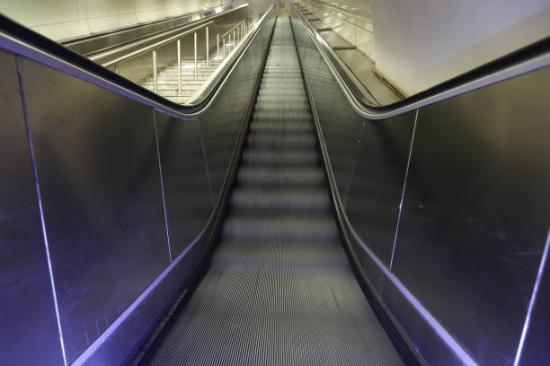 istock Centered View of Empty Stairs in a Metro Station 1288482251