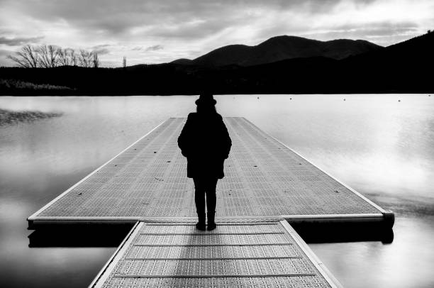 istock Woman on piediluco pier 1288487834