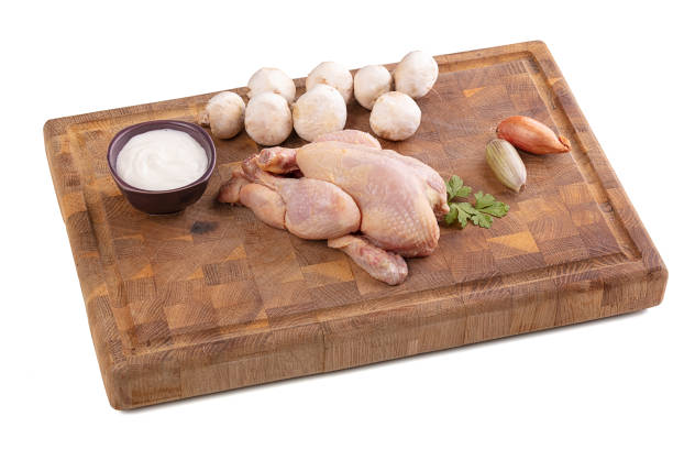 istock Ingredient for cooking a cockerel on a cutting board 1288488728