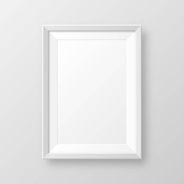 istock Realistic blank white picture frame with shadow isolated on gray background. Modern poster mockup. Empty photo frame for art gallery or interior. Vector illustration 1288489106