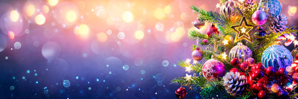 istock Christmas Tree And Baubles On Abstract Defocused Background 1288500628