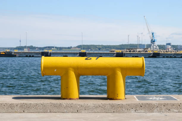 Marine tie down bollards along the shores of Tallinn Marine tie down bollards along the shores of Tallinn bollard pier water lake stock pictures, royalty-free photos & images
